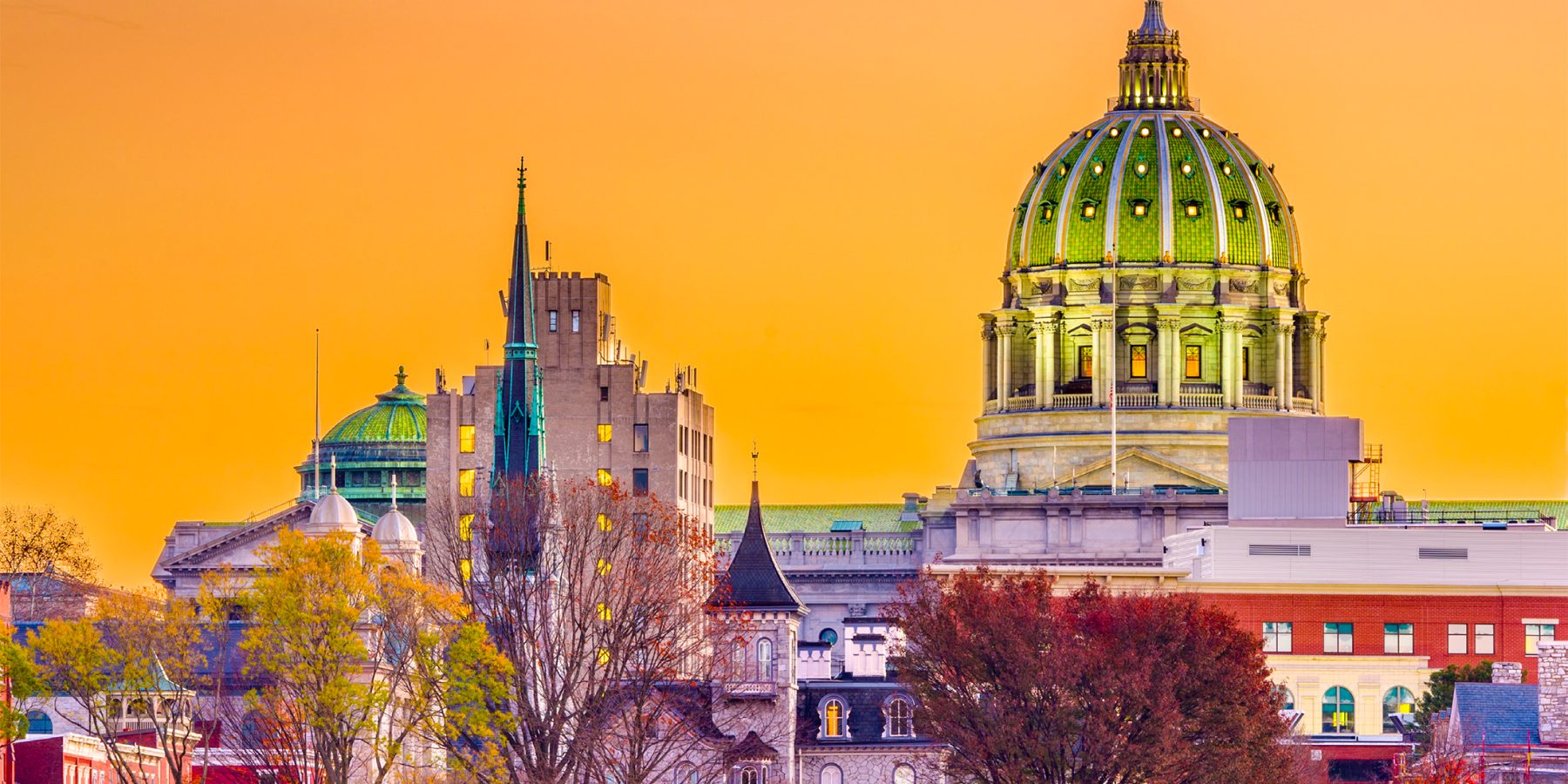 Colorful image of PA Capitol and surrounding buildings